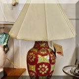 L26. Red and green Wildwood table lamp. 
